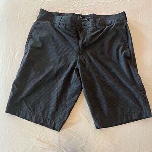Travis Matthew black shorts
